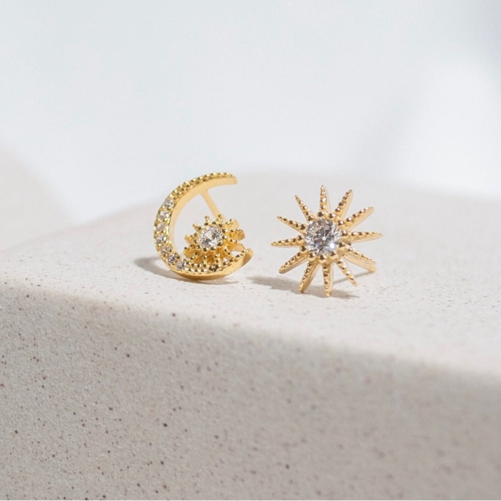 CZ star and moon asymmetrical gold plated stud earrings. New.